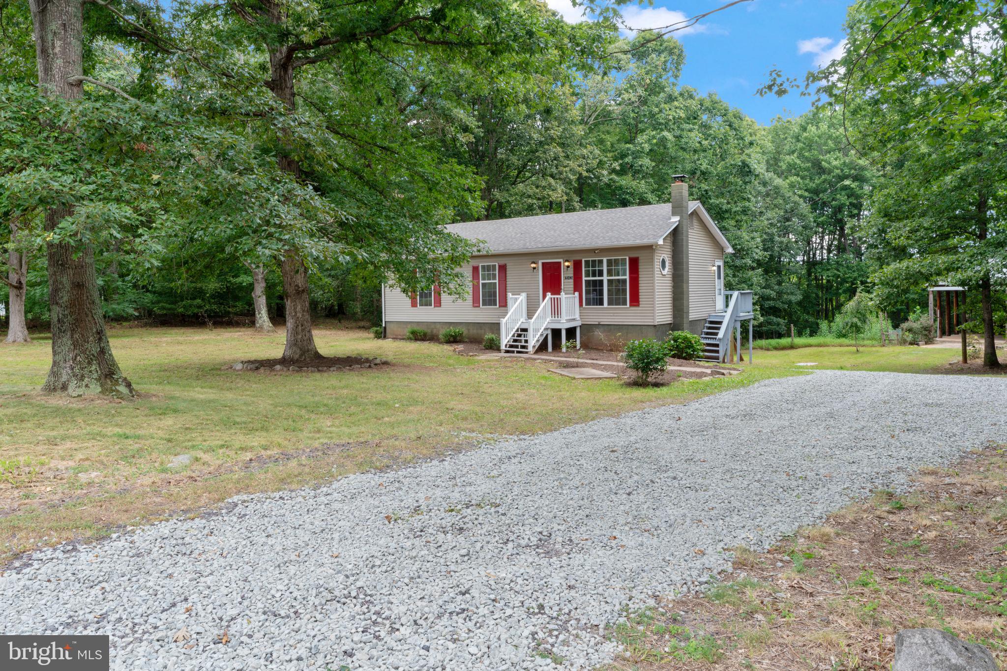 1543 Vawter Corner Road Louisa, VA 23093 - Photo 3 of 43 a view of a house with a yard