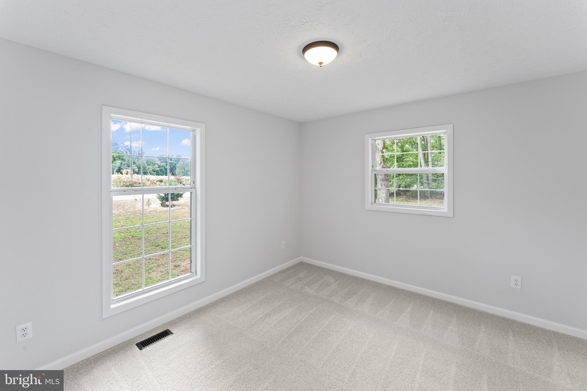 1543 Vawter Corner Road Louisa, VA 23093 - Photo 31 of 43 an empty room with a window