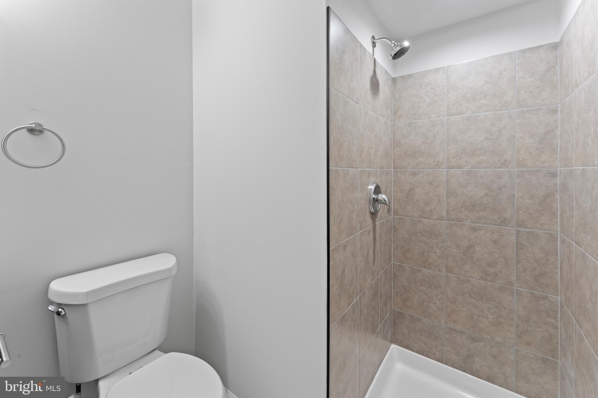 1543 Vawter Corner Road Louisa, VA 23093 - Photo 36 of 43 a white toilet sitting next to a bathroom