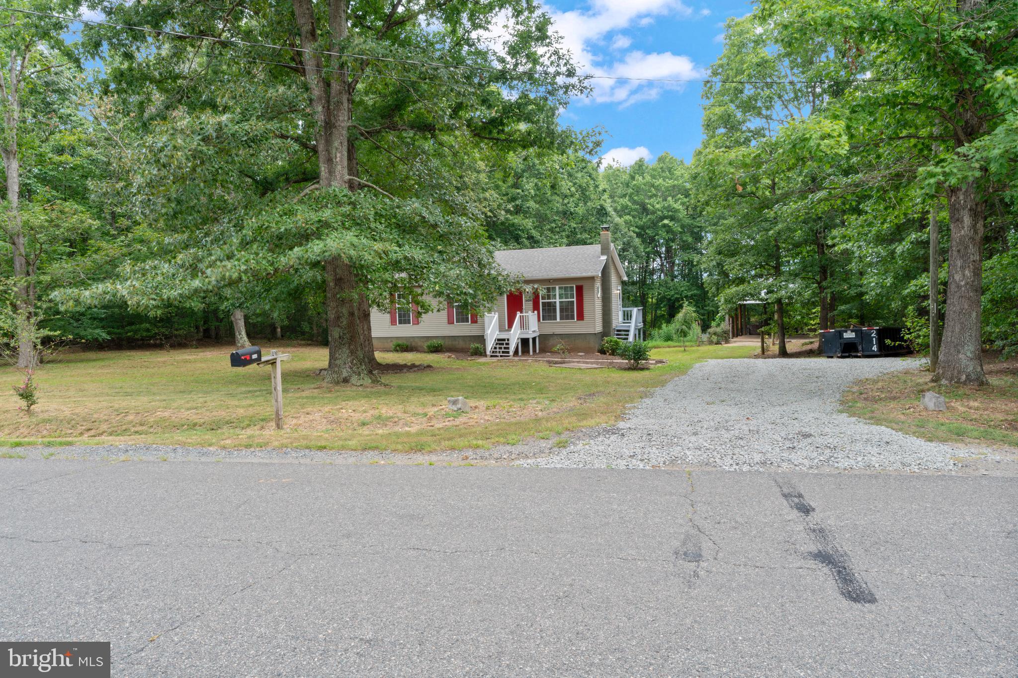 1543 Vawter Corner Road Louisa, VA 23093 - Photo 4 of 43 a view of a house with a yard and sitting area