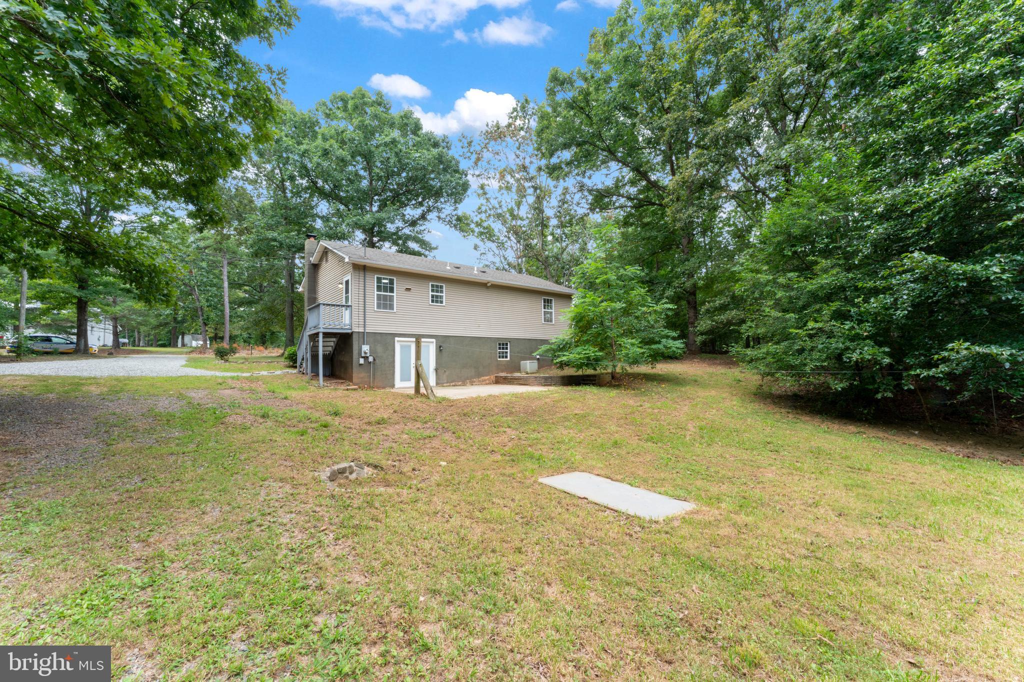 1543 Vawter Corner Road Louisa, VA 23093 - Photo 9 of 43 a house view with a outdoor space