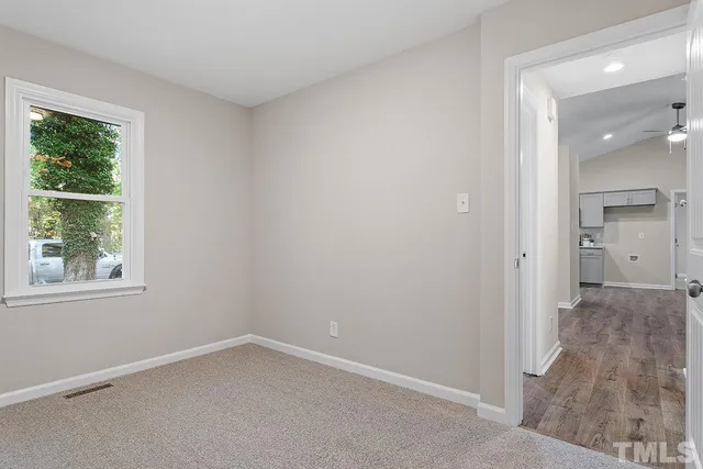 a house view with a backyard space