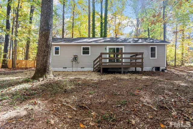 a view of a bench in a yard