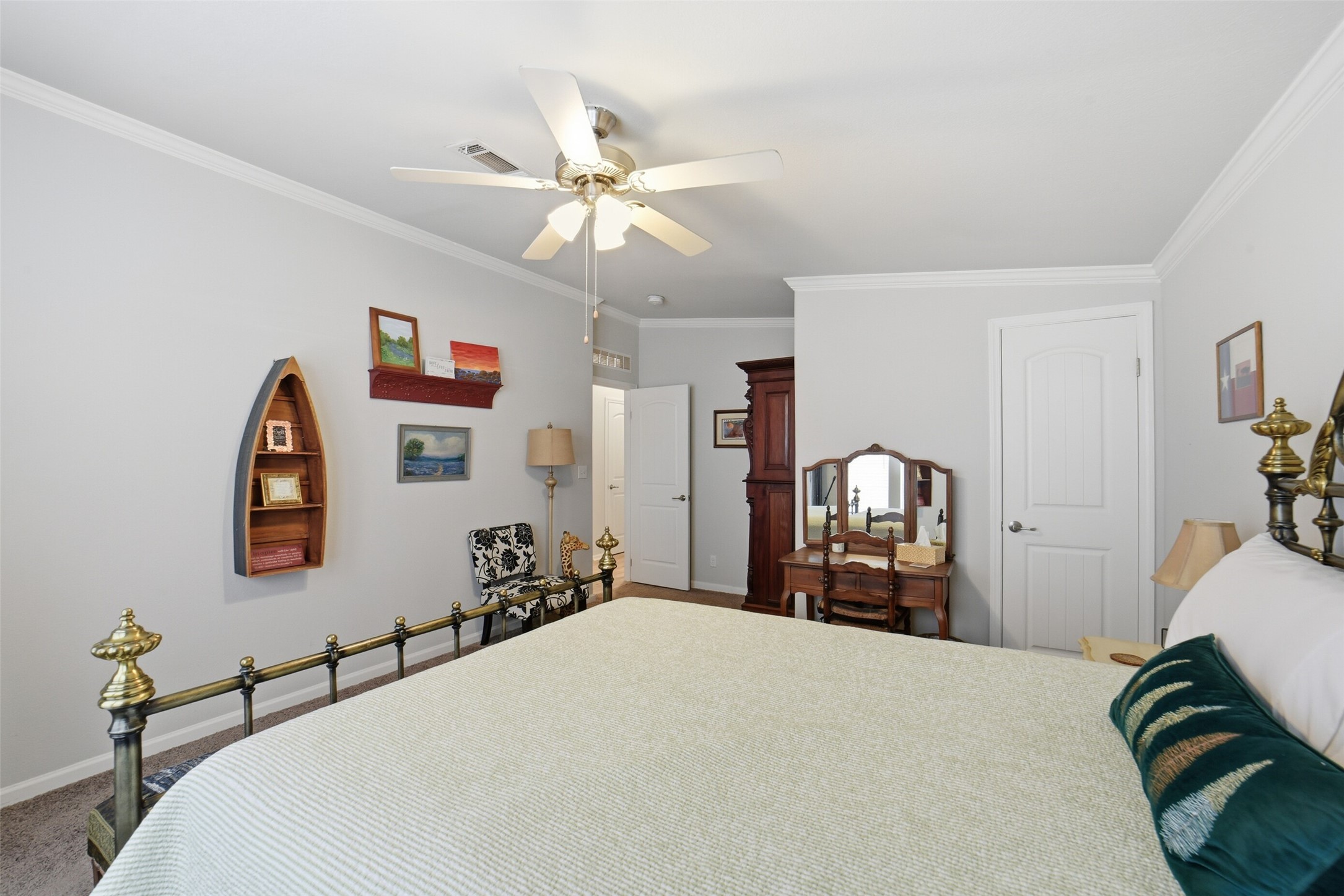 4007 Nancy Lane, Unit C546B Rosharon, TX 77583 - Photo 39 of 50 a bedroom with a bed and a chandelier