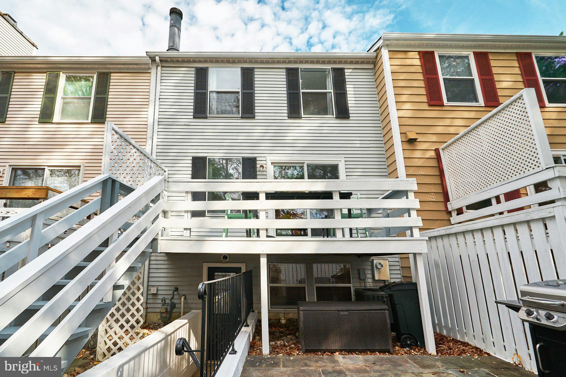 1750 Sundance Drive Reston, VA 20194 - Photo 32 of 36 a front view of a building with glass windows