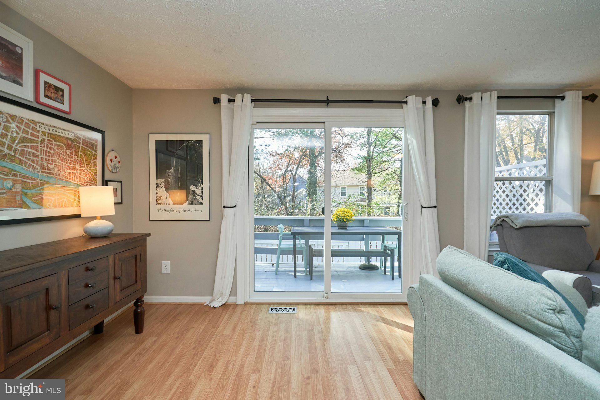 1750 Sundance Drive Reston, VA 20194 - Photo 5 of 36 a living room with furniture and a large window