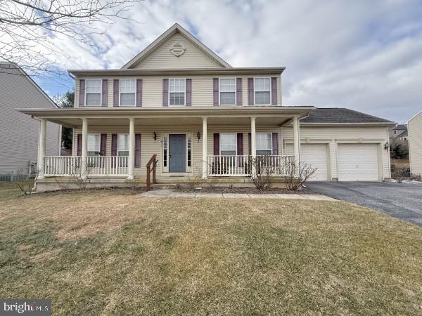 233 Sunset Circle Red Lion, PA 17356 - Photo 1 of 2 a front view of a house with yard