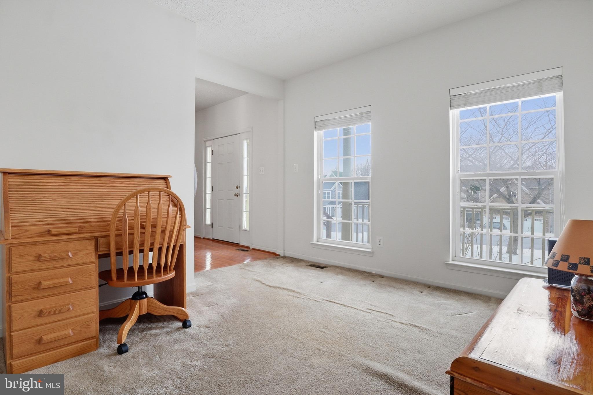 233 Sunset Circle Red Lion, PA 17356 - Photo 13 of 54 a view of a bedroom with furniture and windows