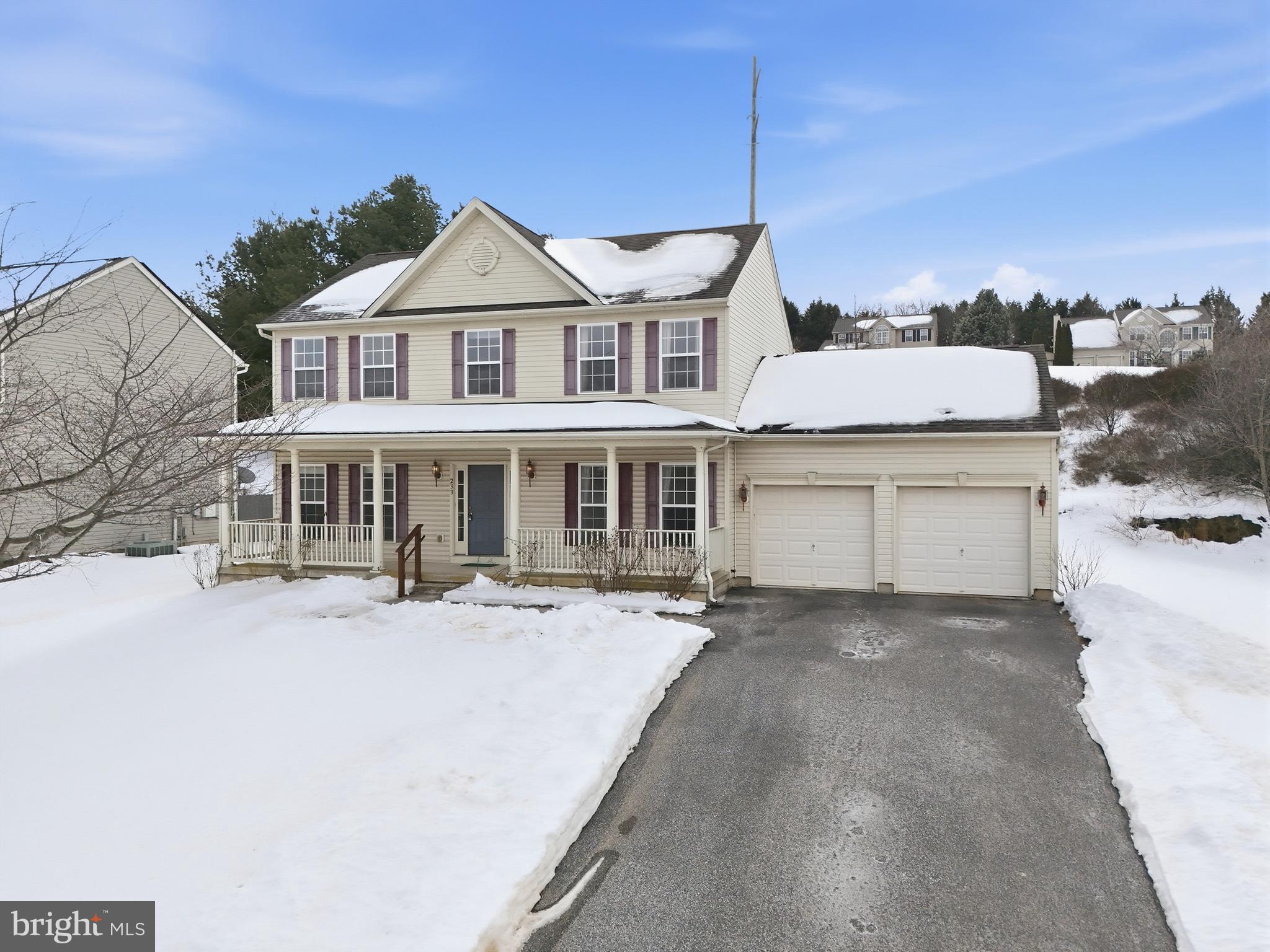 233 Sunset Circle Red Lion, PA 17356 - Photo 2 of 54 a front view of a house with yard and porch