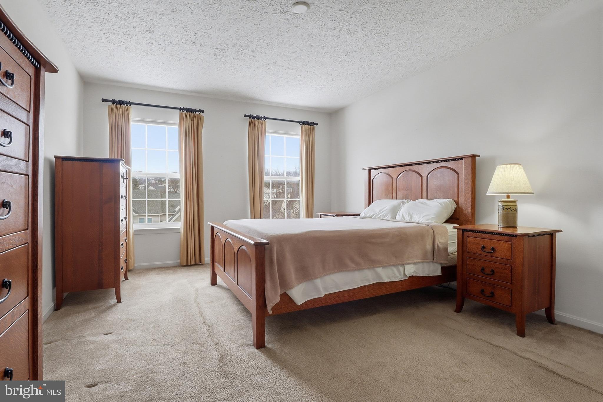 233 Sunset Circle Red Lion, PA 17356 - Photo 22 of 54 a bed room with a bed and a window