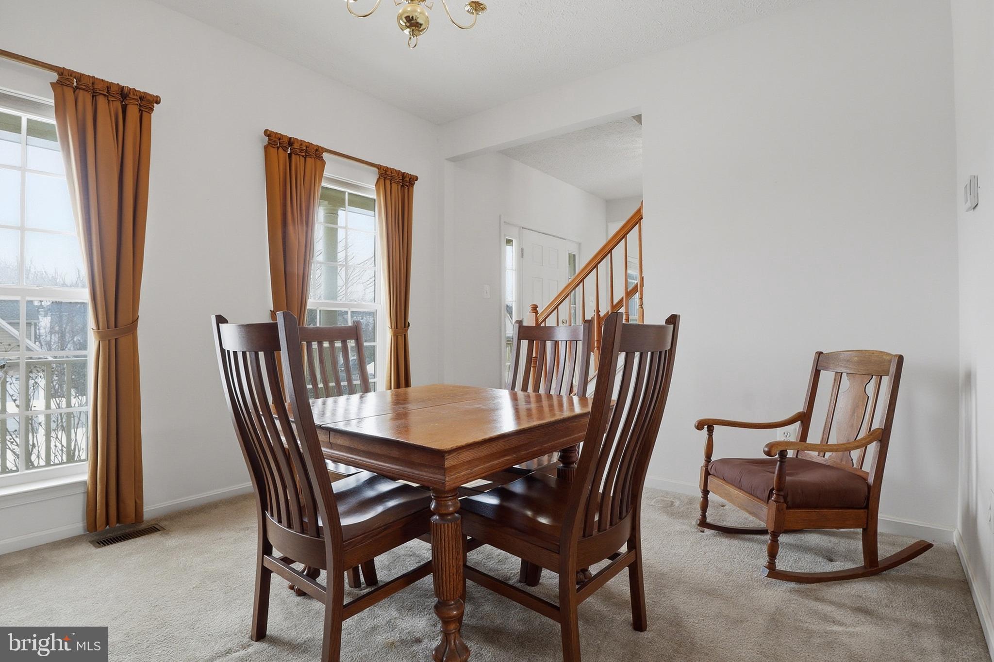 233 Sunset Circle Red Lion, PA 17356 - Photo 4 of 54 a view of a dining room with furniture and window