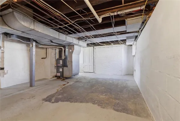 a view of a room with wooden walls