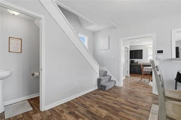 a view of livingroom with furniture and wooden floor