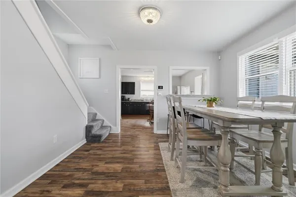 a living room with furniture and a table