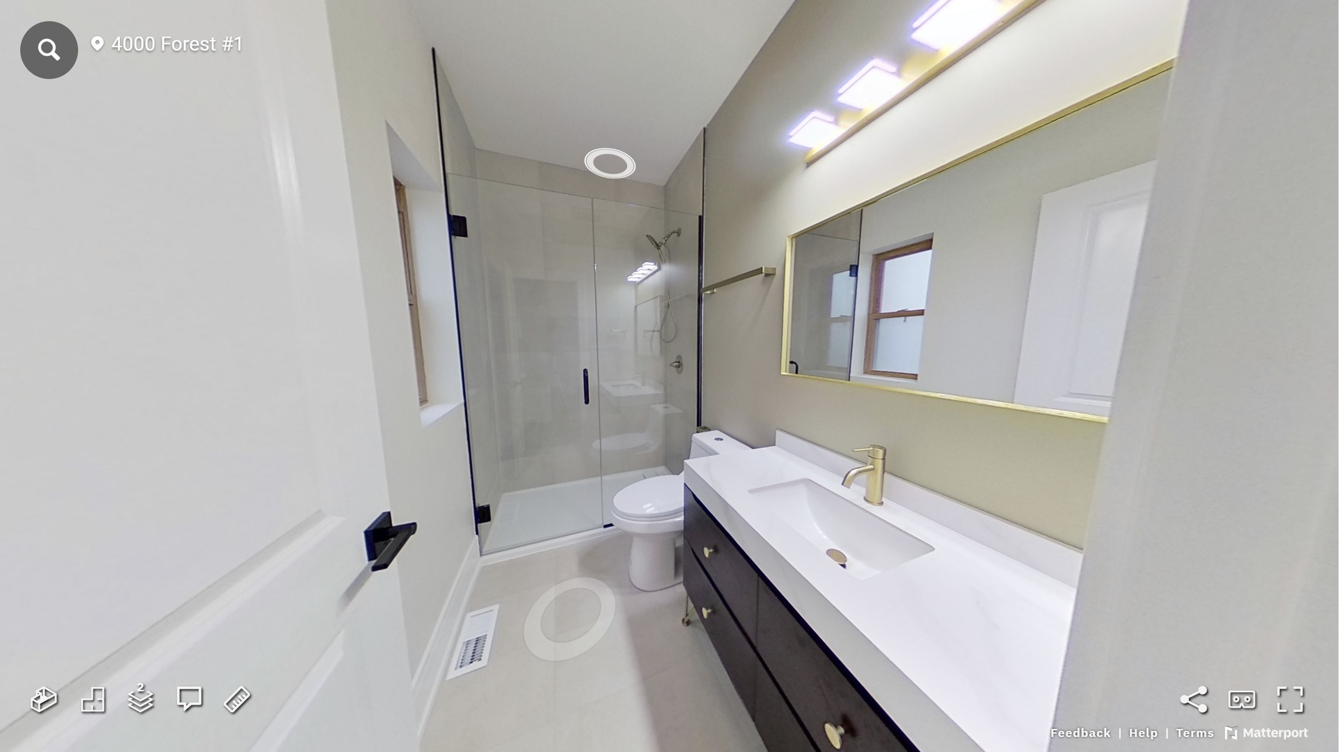 4000 Forest Avenue, Unit 1 Brookfield, IL 60513 - Photo 6 of 10 a bathroom with a sink a toilet and shower
