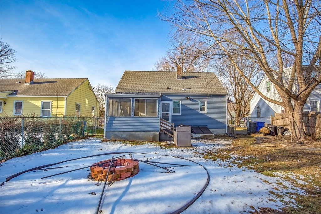 65 Garland Street Springfield, MA 01118 - Photo 35 of 39 a front view of a house with a yard