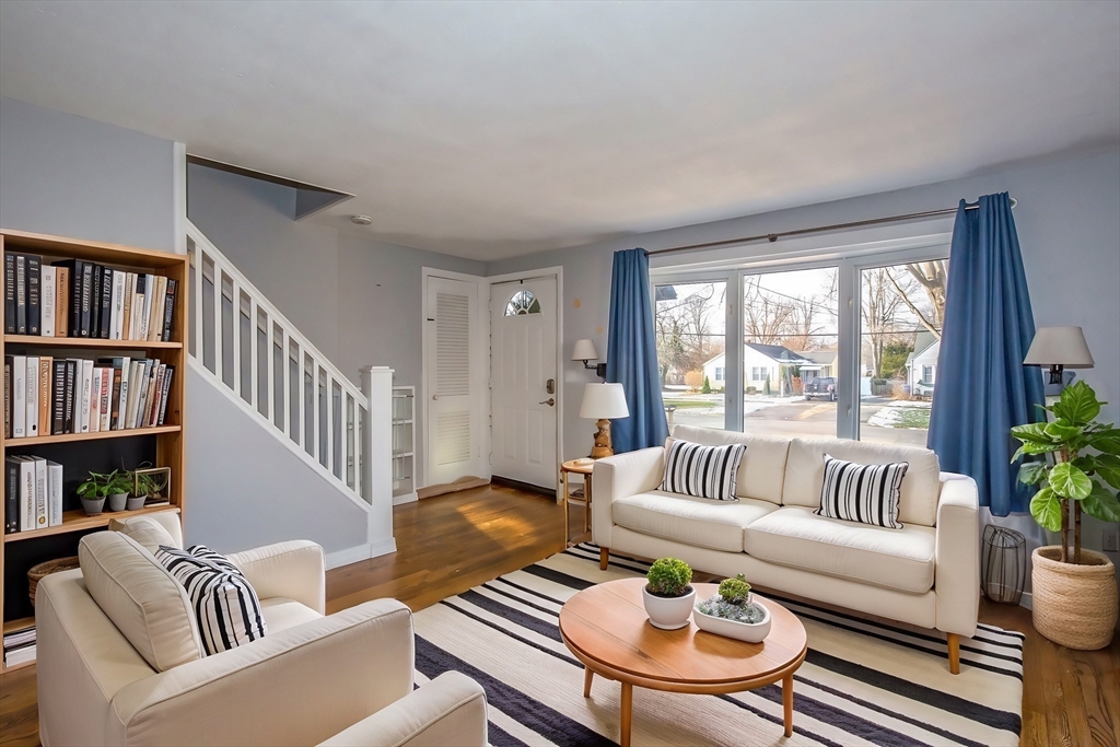 65 Garland Street Springfield, MA 01118 - Photo 5 of 39 a living room with furniture and a large window