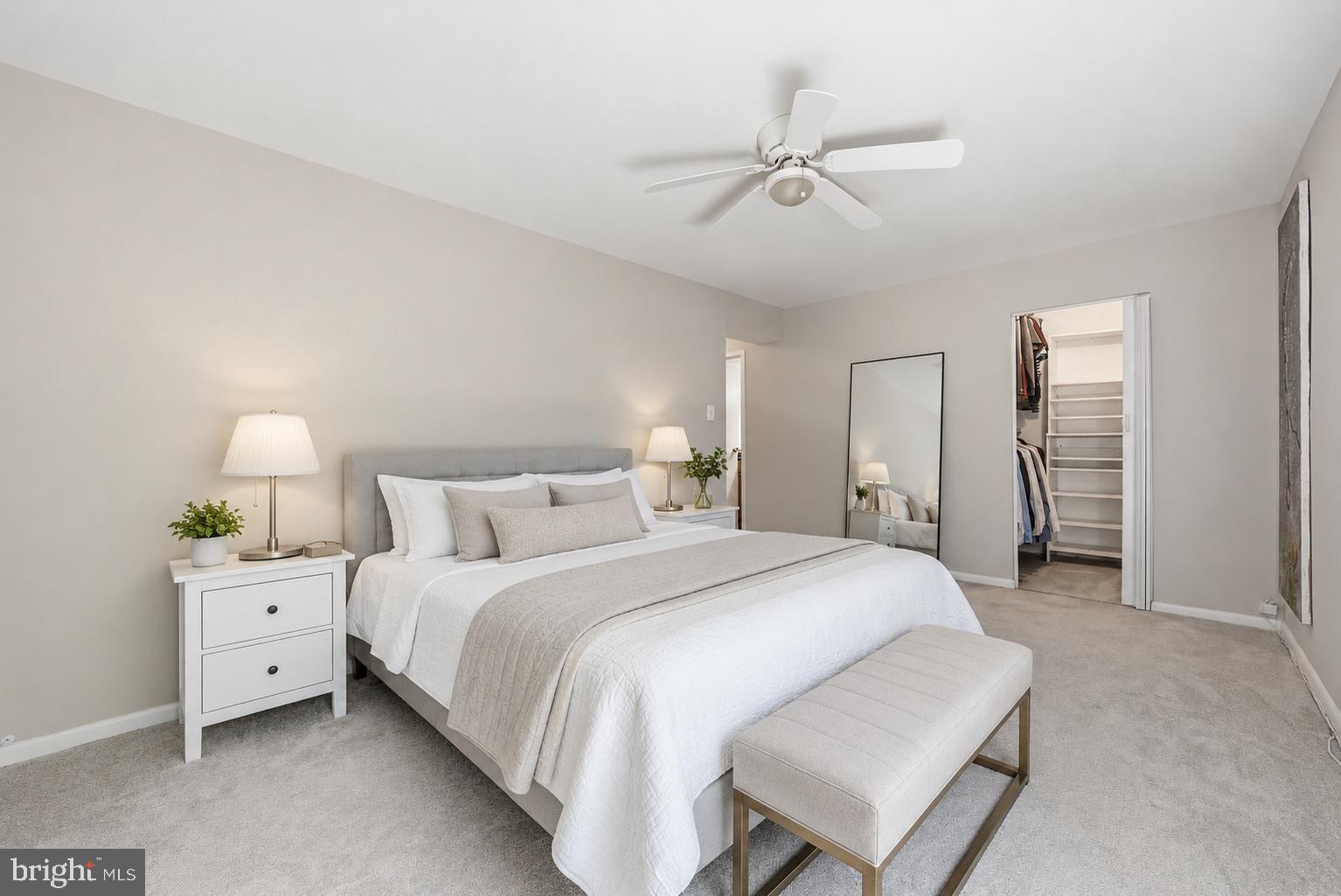 11252 Chestnut Grove Square, Unit 248 Reston, VA 20190 - Photo 10 of 25 Serene bedroom with modern elegance.