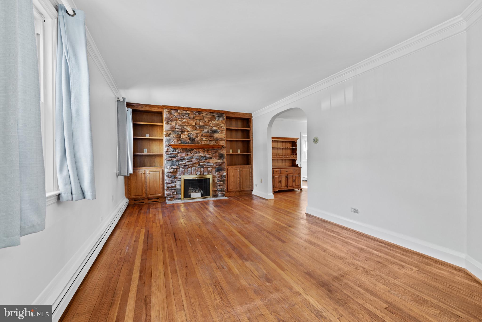 17 Cedarwood Road Baltimore, MD 21228 - Photo 4 of 40 Family room featuring a fireplace