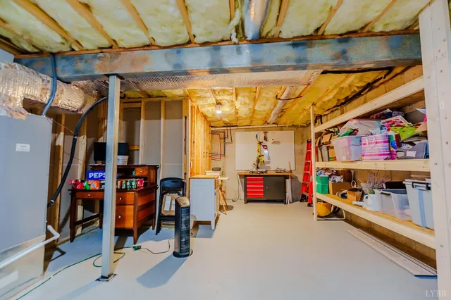 a view of roof deck with furniture