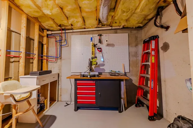a balcony with wooden floor and outdoor seating