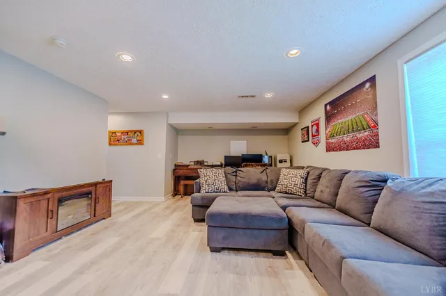 a view of a swimming pool with a yard