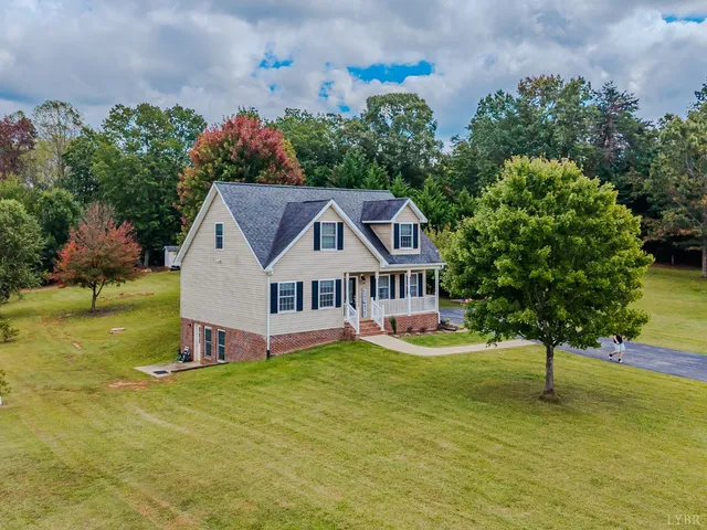 a very nice looking dining room with a large window