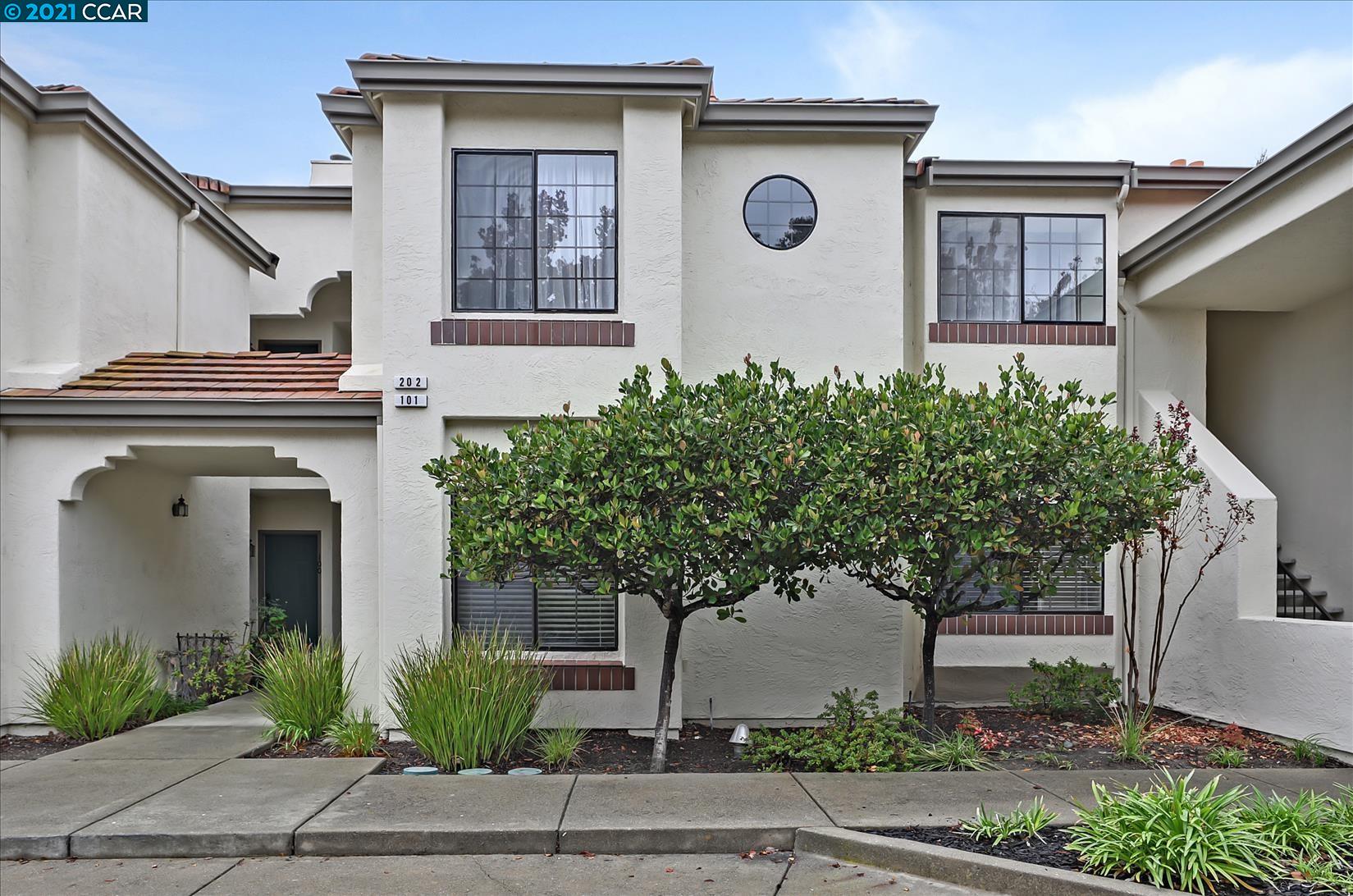 85 Tahoe Court, Unit 101 San Ramon, CA 94582 - Photo 1 of 1 a front view of a house with plants