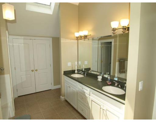 18 Corn Road Bolton, MA 01740 - Photo 8 of 12 a bathroom with a sink and a mirror