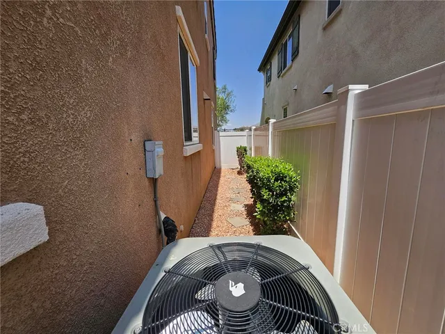a view of balcony with furniture