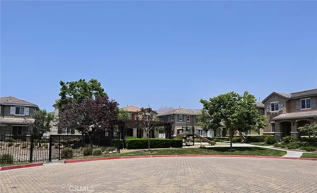 a front view of a building with street view