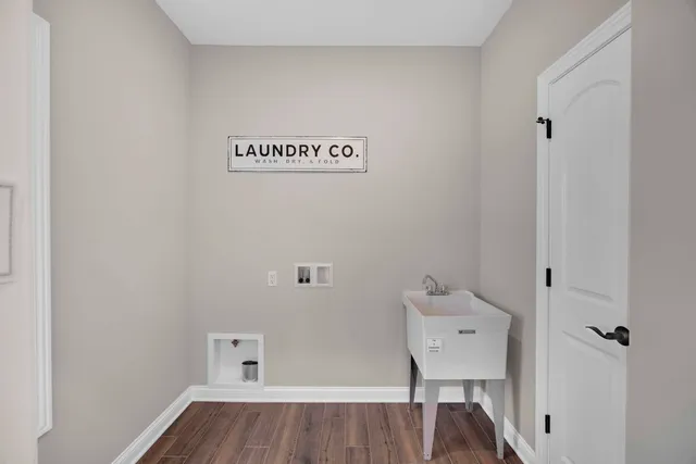 a bathroom with a double vanity sink mirror and shower