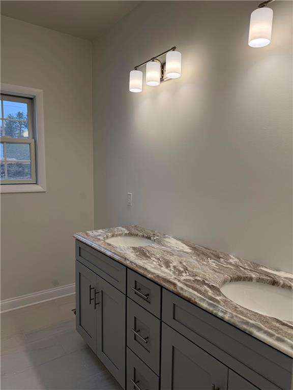 306 Hunters Crossing Canonsburg, PA 15317 - Photo 17 of 27 a bathroom with a granite countertop sink and vanity