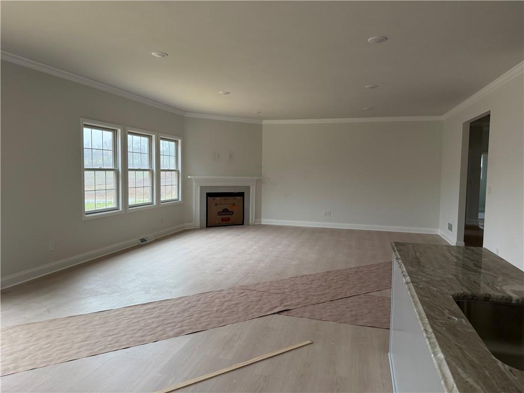 306 Hunters Crossing Canonsburg, PA 15317 - Photo 25 of 27 an empty room with windows and fireplace