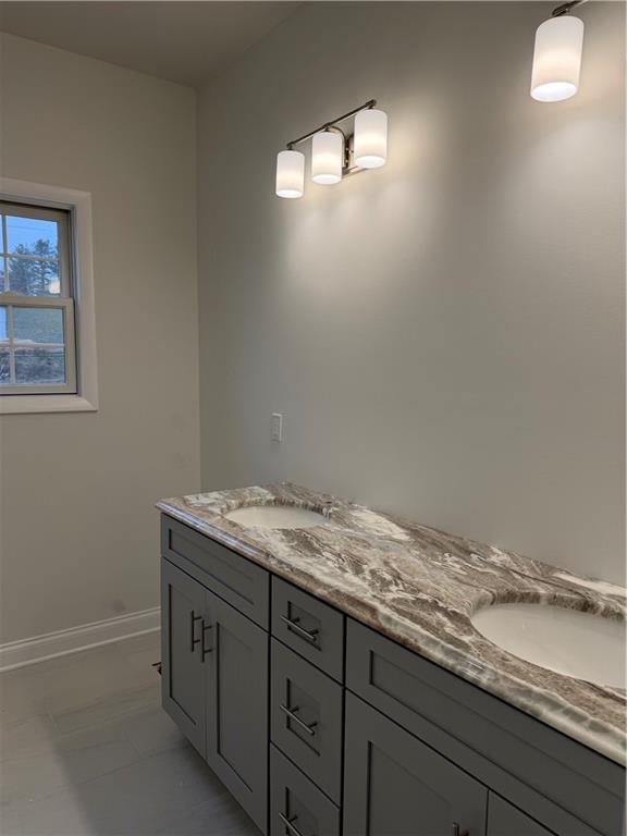 306 Hunters Crossing Canonsburg, PA 15317 - Photo 26 of 27 a bathroom with a granite countertop sink and vanity
