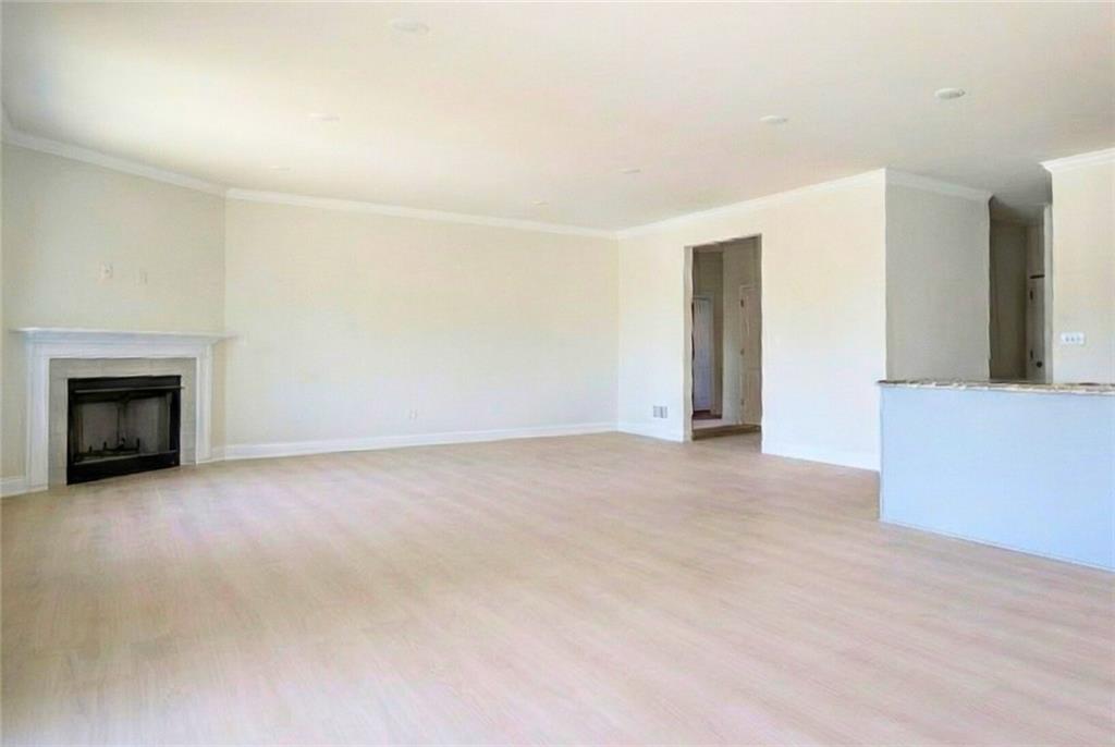306 Hunters Crossing Canonsburg, PA 15317 - Photo 7 of 28 a view of an empty room with a fireplace