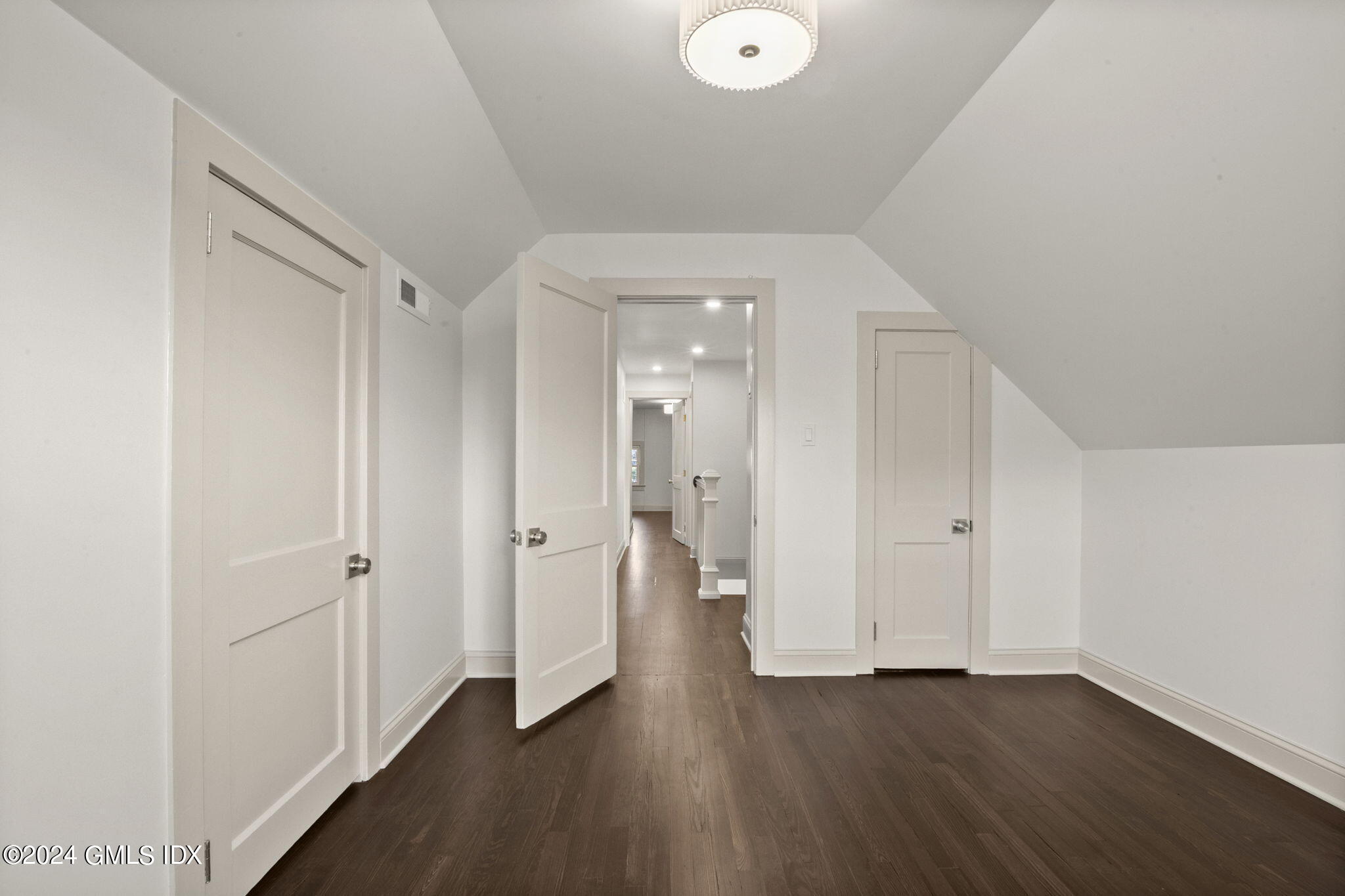 109 Byram Road, Unit B Greenwich, CT 06830 - Photo 16 of 25 wooden floor in an empty room