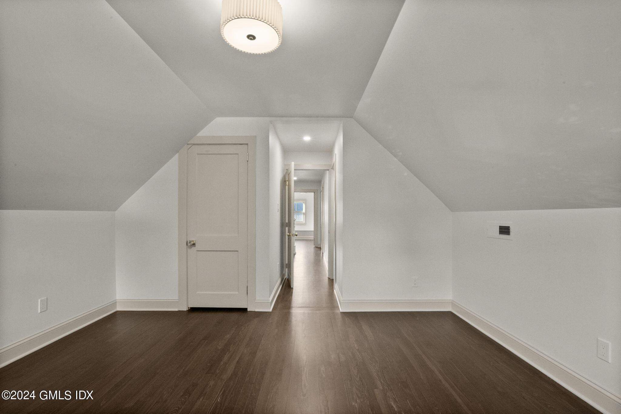 109 Byram Road, Unit B Greenwich, CT 06830 - Photo 22 of 25 a view of a livingroom with wooden floor