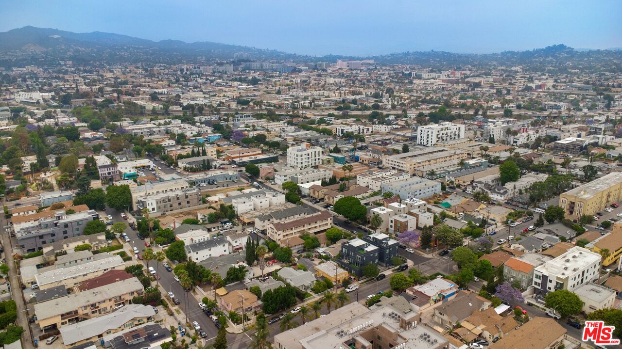 4713 Clinton Street Los Angeles, CA 90004 - Photo 17 of 25 an aerial view of residential houses with outdoor space