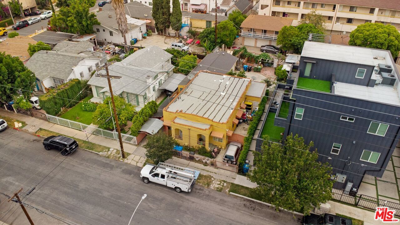 4713 Clinton Street Los Angeles, CA 90004 - Photo 24 of 25 an aerial view of residential houses with outdoor space