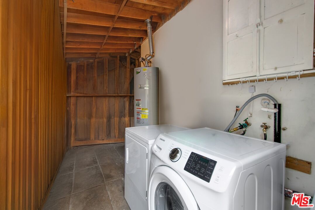 4713 Clinton Street Los Angeles, CA 90004 - Photo 9 of 25 a utility room with dryer and washer