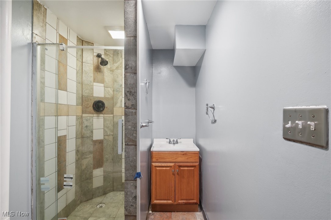 1042 Ansel Road Cleveland, OH 44103 - Photo 31 of 36 Bathroom with a shower with door and vanity