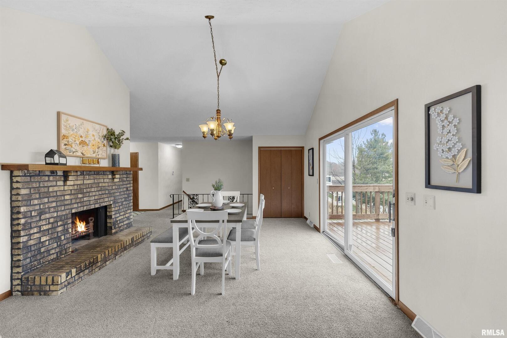 209 Lake View Court Colona, IL 61241 - Photo 5 of 32 a view of a livingroom with furniture and fireplace