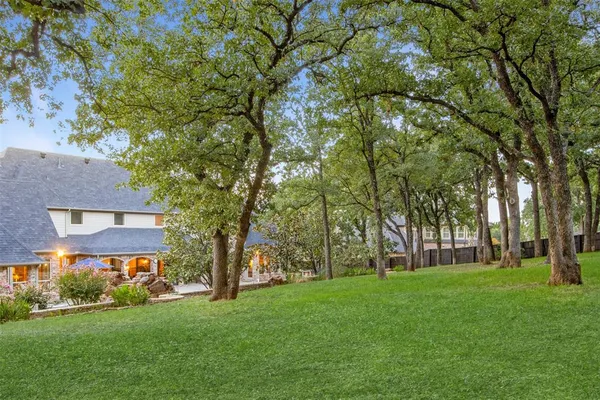 a view of a building with a yard