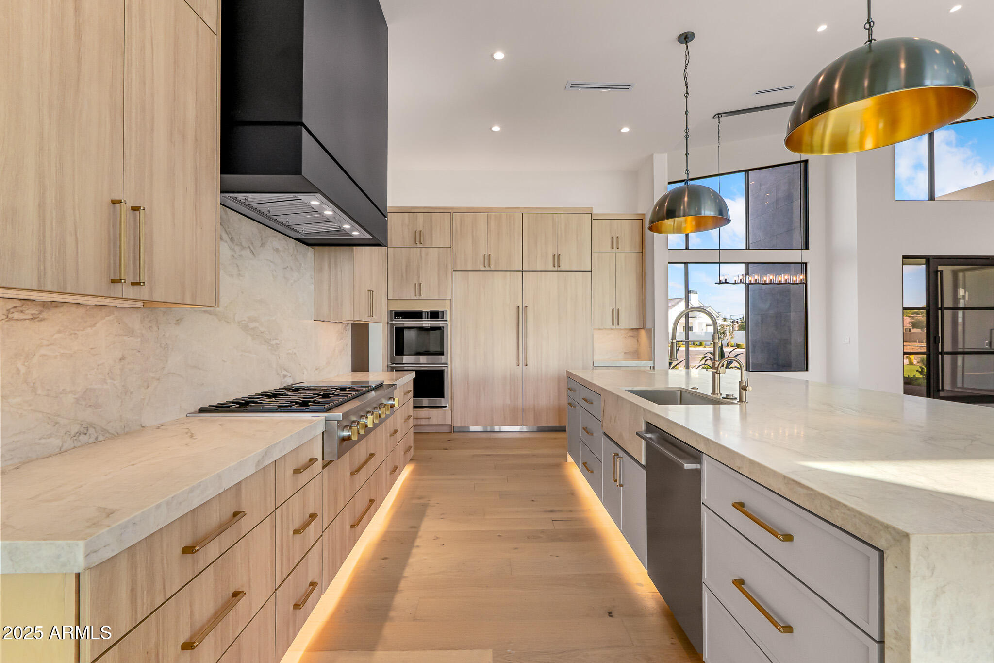 6260 South Key Biscayne Court Gilbert, AZ 85298 - Photo 15 of 68 a large kitchen with stainless steel appliances granite countertop a stove and a sink