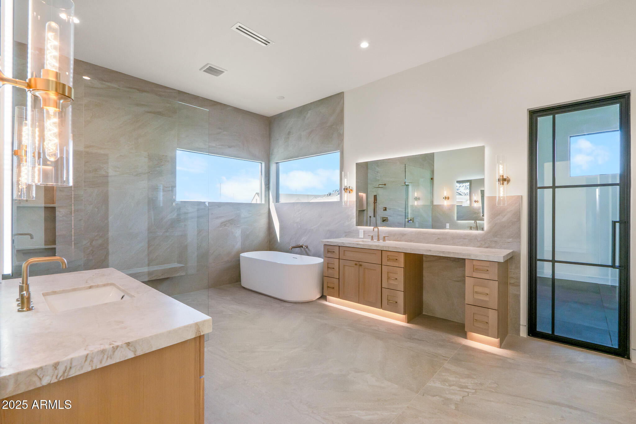 6260 South Key Biscayne Court Gilbert, AZ 85298 - Photo 24 of 68 a bathroom with a granite countertop sink and a mirror