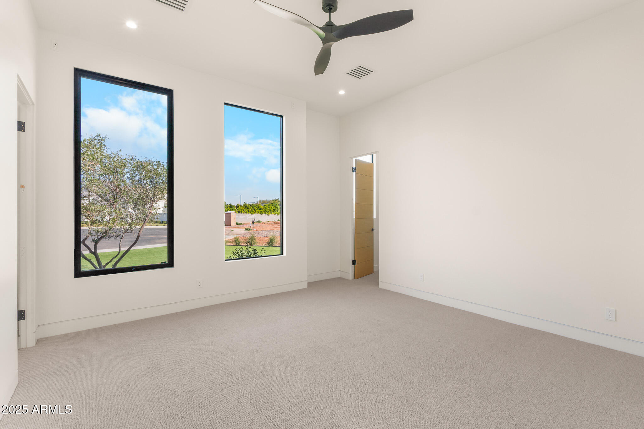 6260 South Key Biscayne Court Gilbert, AZ 85298 - Photo 37 of 68 a view of a livingroom with a ceiling fan and window