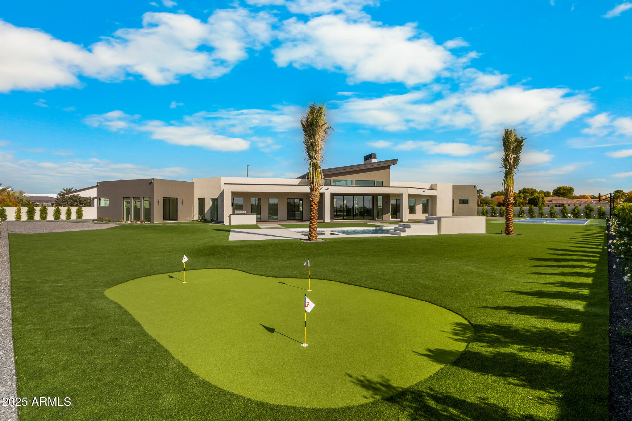 6260 South Key Biscayne Court Gilbert, AZ 85298 - Photo 46 of 68 a view of a house with a swimming pool
