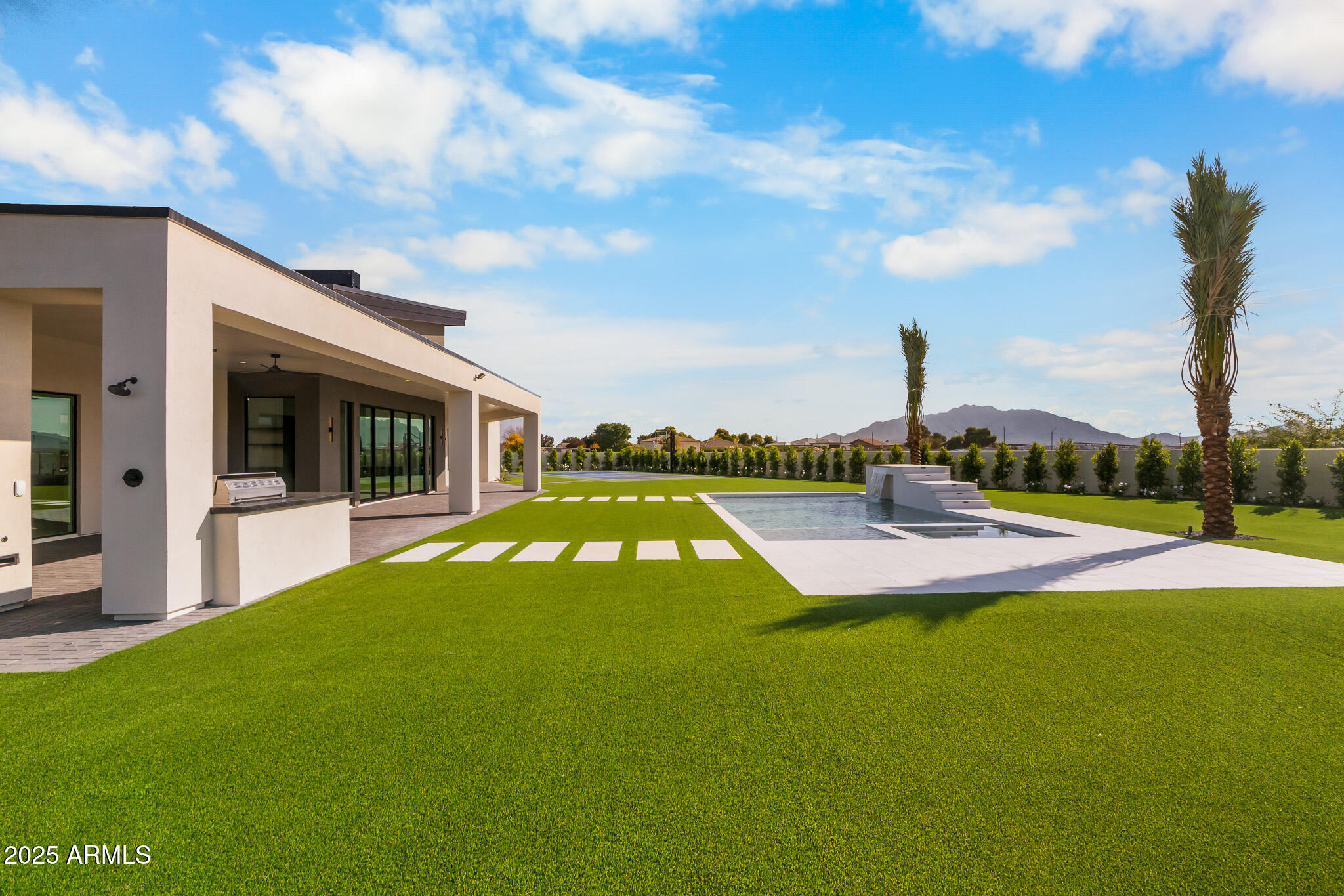 6260 South Key Biscayne Court Gilbert, AZ 85298 - Photo 47 of 68 a view of an house with backyard space and balcony