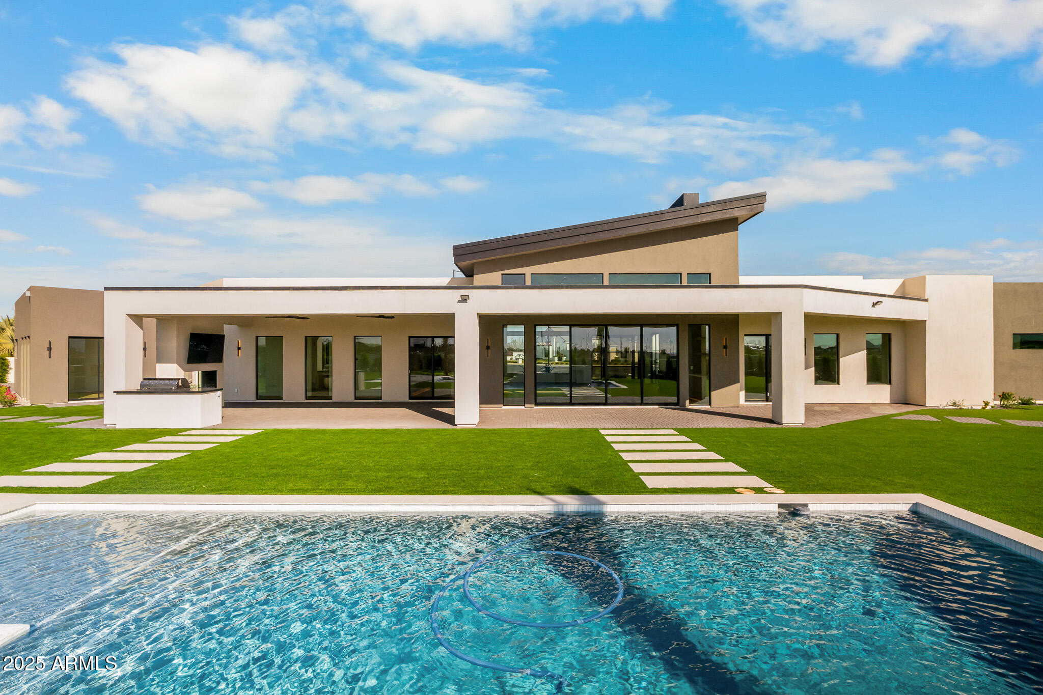 6260 South Key Biscayne Court Gilbert, AZ 85298 - Photo 51 of 68 front view of a house with a yard